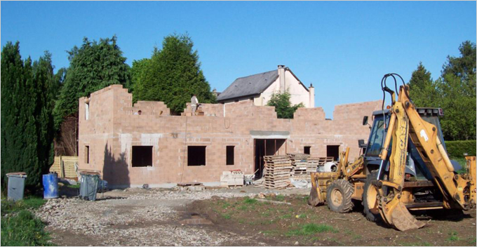 Le premier bâtiment collectif BBC de Normandie en blocs béton isolants - Batiweb